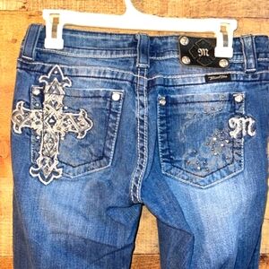 SOLD Miss Me cross boot cut jeans